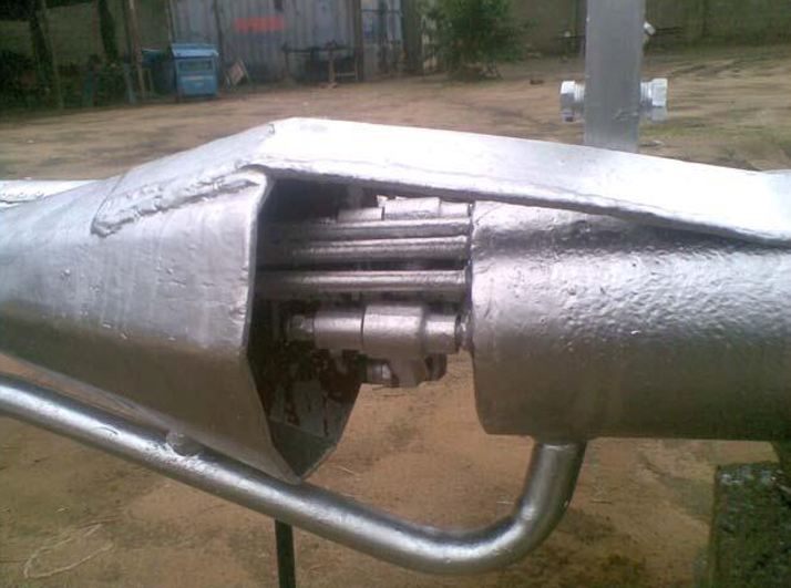A close-up of a metal object
                        
                        Description automatically generated