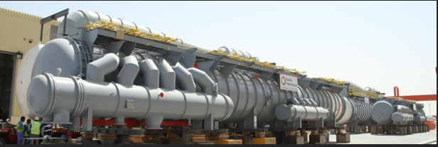 A large grey pipe on a truck

Description automatically generated