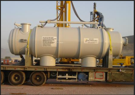 A person on a trailer carrying a large white container

Description automatically generated